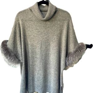 SOFIA CASHMERE
100% Cashmere Fox Trim sweater. Runs big and will fit S or M.
